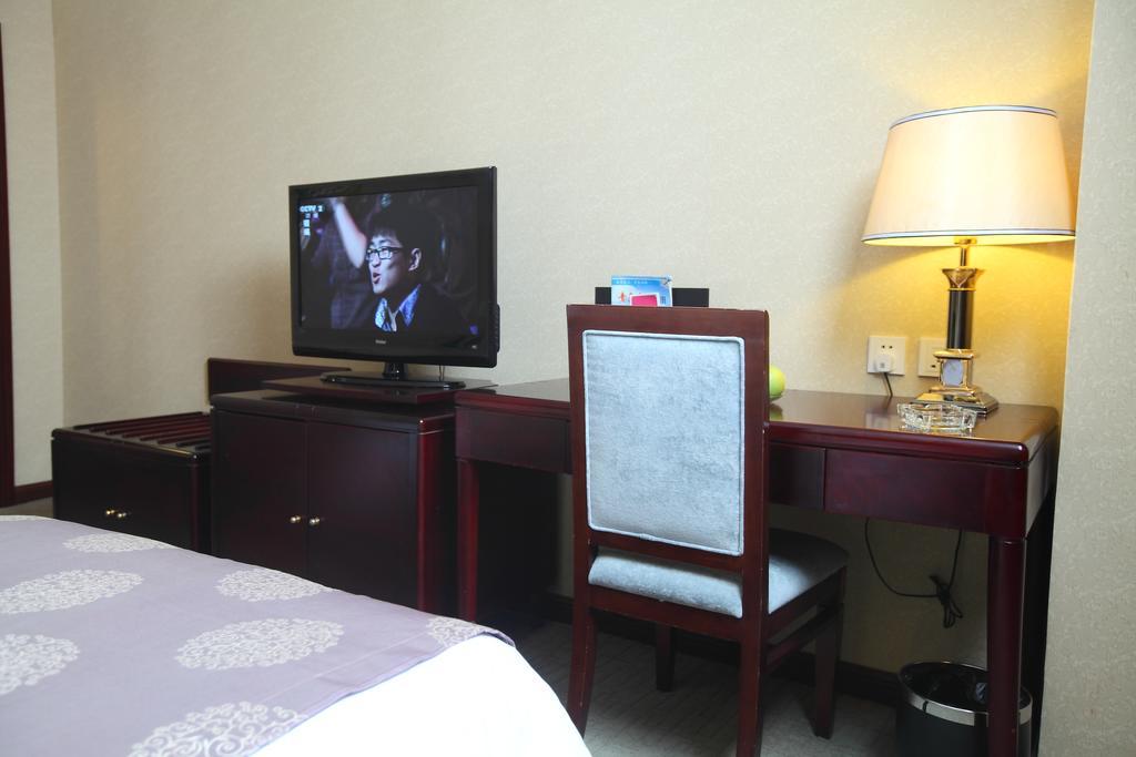 Qingdao Sanfod Hotel 部屋 写真