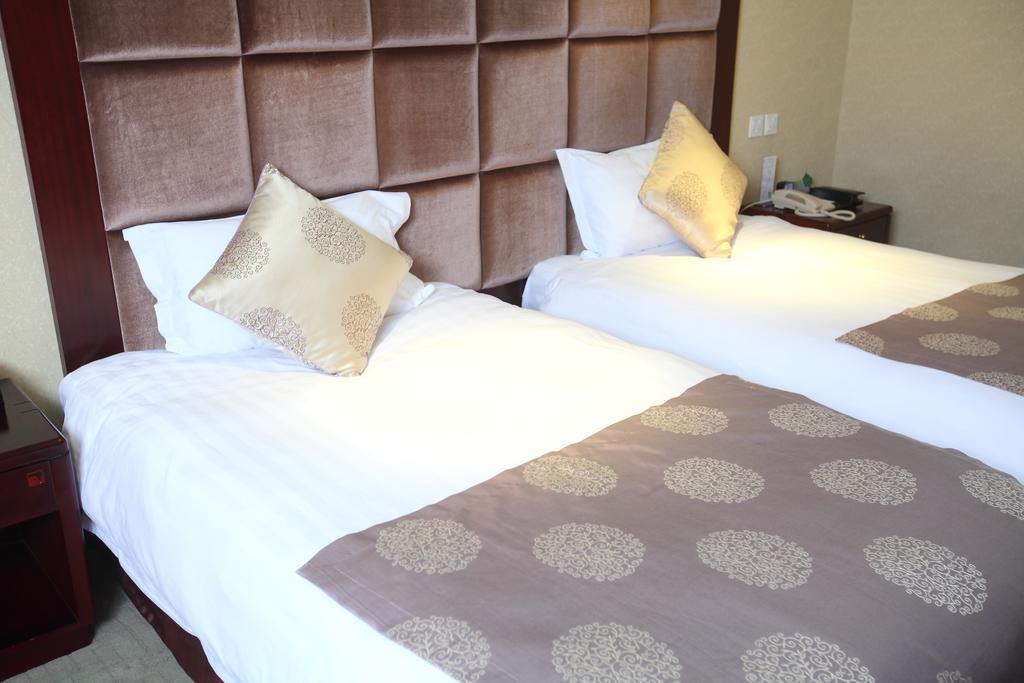 Qingdao Sanfod Hotel 部屋 写真