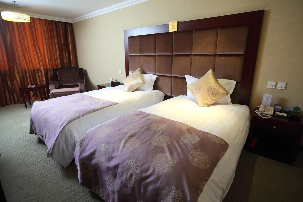 Qingdao Sanfod Hotel 部屋 写真
