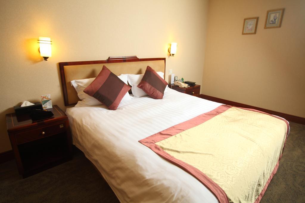 Qingdao Sanfod Hotel 部屋 写真