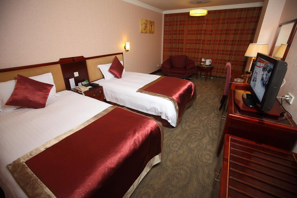 Qingdao Sanfod Hotel 部屋 写真